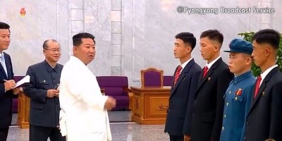 Kim Jong Un Meets Young People who Volunteered to Difficult Sectors